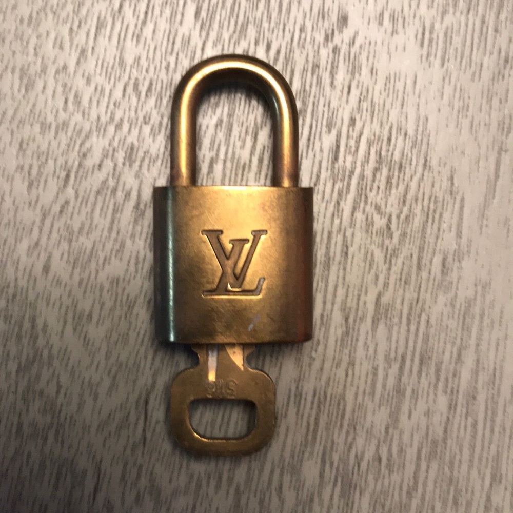 Authentic Louis Vuitton lock with key